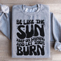 Be Like The Sun Keep On Shining And Let Them Burn Sweatshirt product image 1