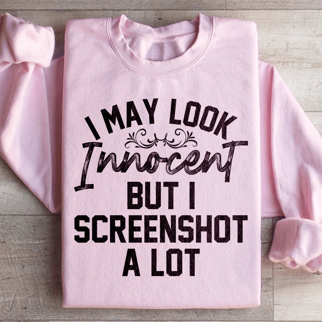 I May Look Innocent But I Screenshot A Lot Sweatshirt product image 1