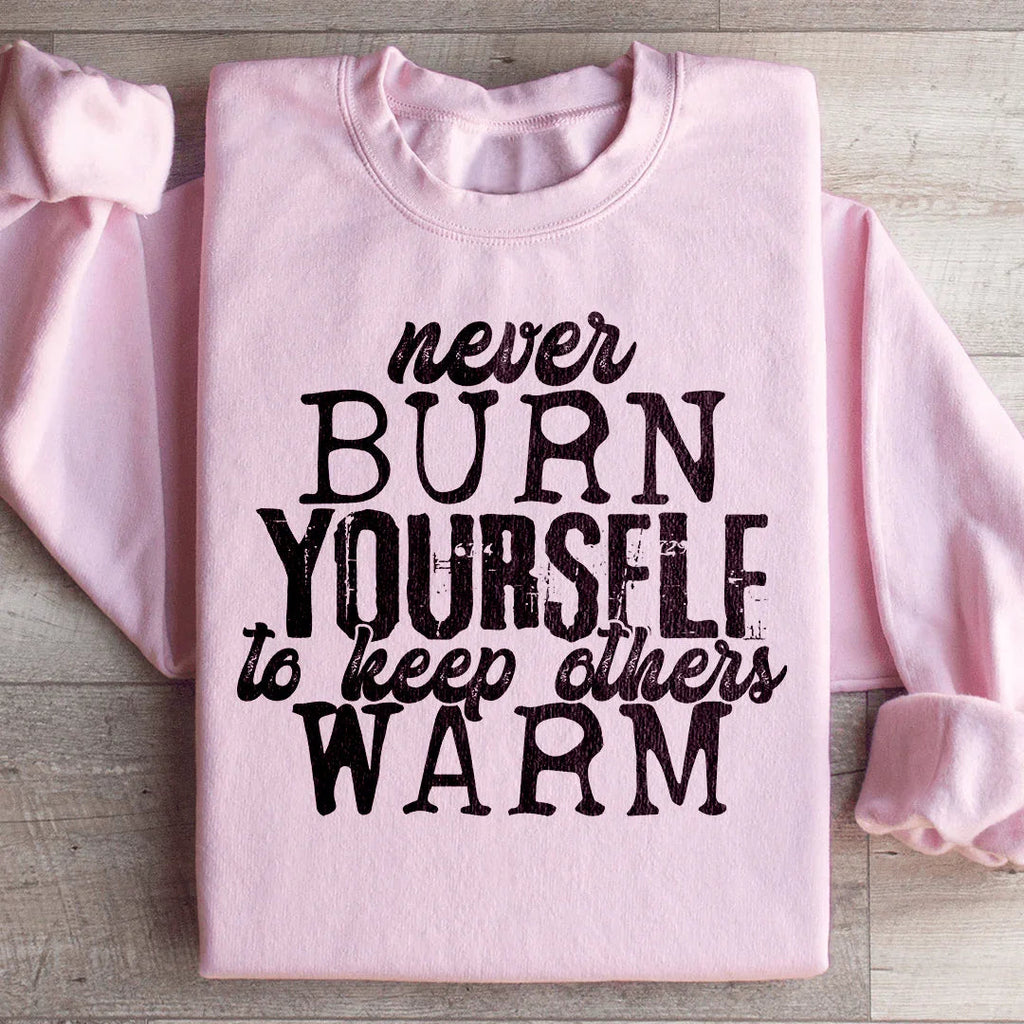 Never Burn Yourself To Keep Others Warm Sweatshirt product image 1
