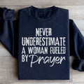 Never Underestimate A Woman Fueled By Prayer Sweatshirt product image 1