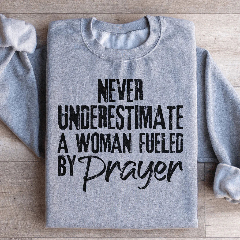 Never Underestimate A Woman Fueled By Prayer Sweatshirt product image 3
