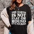 "The Earth Isn't Flat Or Round" – Sarcastic Humor Graphic product image 1