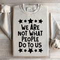 We Are Not What People Do To Us Sweatshirt product image 1